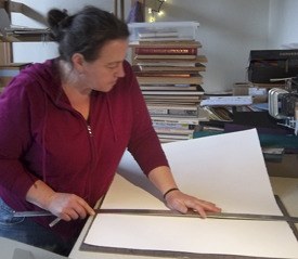 Brenna Nies working in her studio