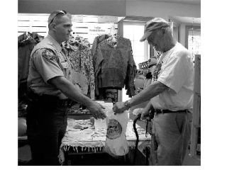 Deputy Scott Taylor  and Bob Green at the Lopez Pharmacy during the Lopez medication take-back program early in 2010.