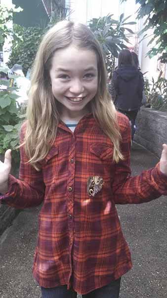 Fifth-grader Kayla McClerren with her bright eyes and happy smile at the Pacific Science Center during a Lopez School field trip.