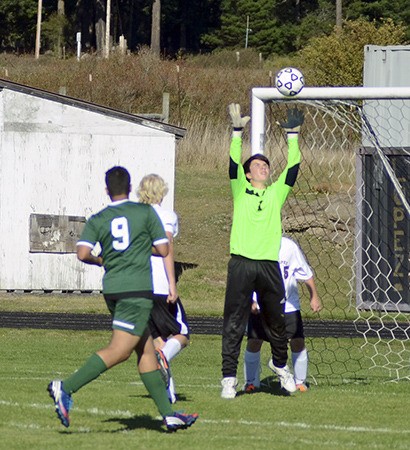 Lopez goalie Will Fields makes a(nother) save against Bear Creek.  Second half action was played largely in front of the Lobos’ goal as a small Lopez squad fought against a continually substituting Bear Creek team.