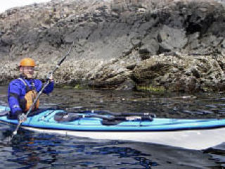 Colin Doherty kayaking at Cattle Pass