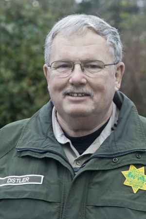 Bruce Distler has been promoted to undersheriff of San Juan County. He will continue to reside on Orcas Island and commute to San Juan Island.