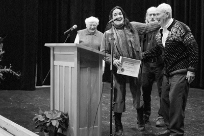 Gregg Blomberg and Irene Skyriver present Lynn and Marlys Waller with the 2011 Spirit Award.