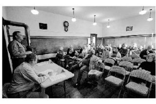 Rob Nou answers a question and Brent Johnson prepares his response at the Sheriff Candidates Forum on Sept. 29 at the Port Stanley School House on Lopez Island. The event was presented by The Islands’ Weekly. Nou and Johnson are candidates in the Nov. 2 election.