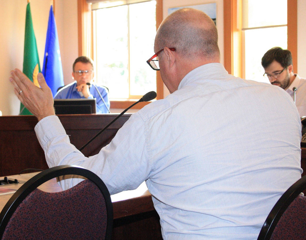 Staff photo/Hayley Day                                San Juan County Councilman Rick Hughes discusses the possibility to increase reservation times for commercial vehicles. When commercial vehicles miss the ferry, said Hughes, local businesses suffer.