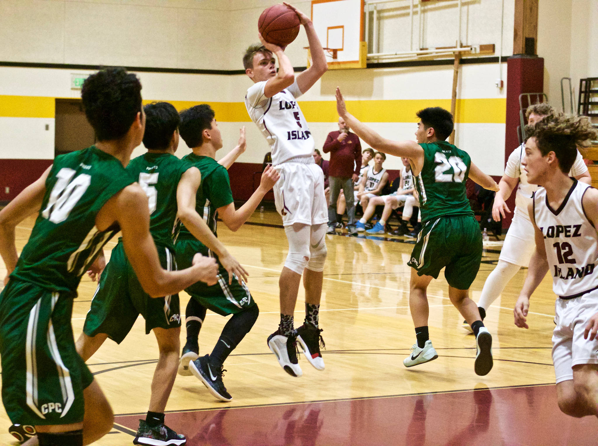 Contributed photo                                Lichen Johnson (5) shoots a jumper against Cedar Park. Johnson was the top Lopez scorer in a close loss at home.