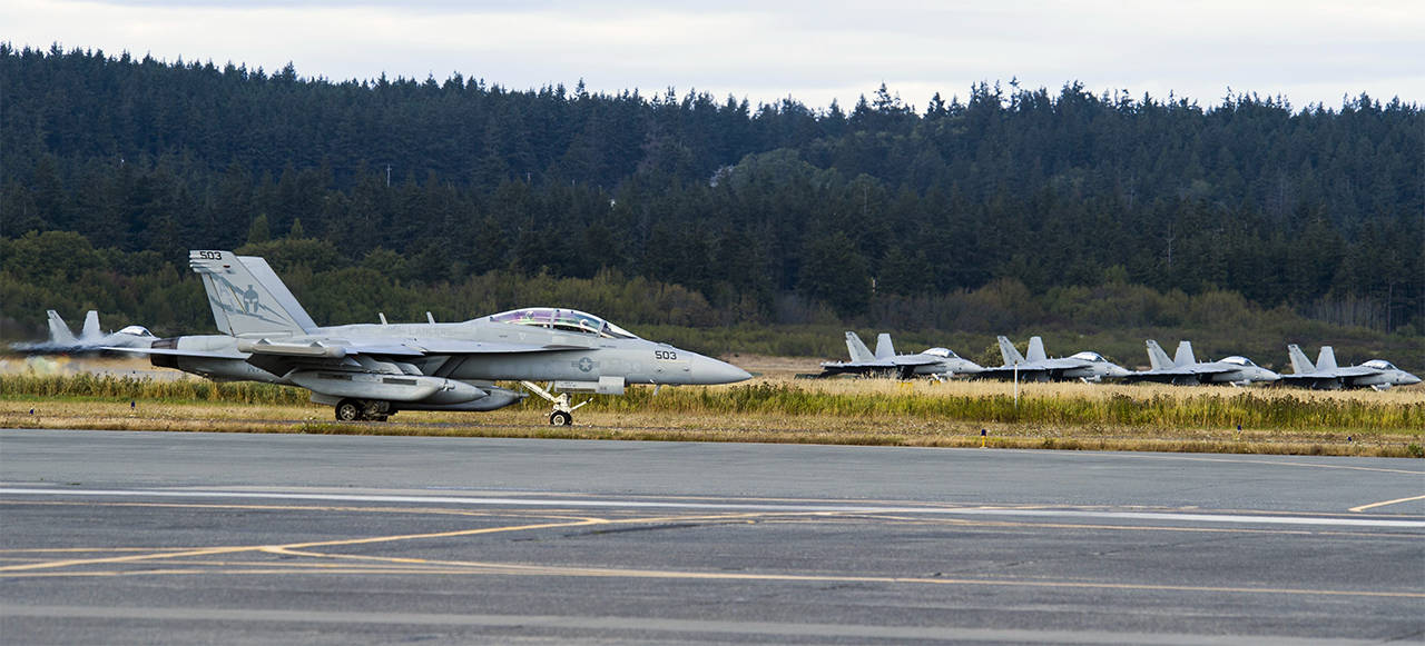 An EA-18G Growler taxis down the airstrip on Naval Air Station Whidbey Island during the squadron’s welcome home ceremony in August 2017. (U.S. Navy photo by Mass Communication Specialist 2nd Class Scott Wood/Contributed photo)