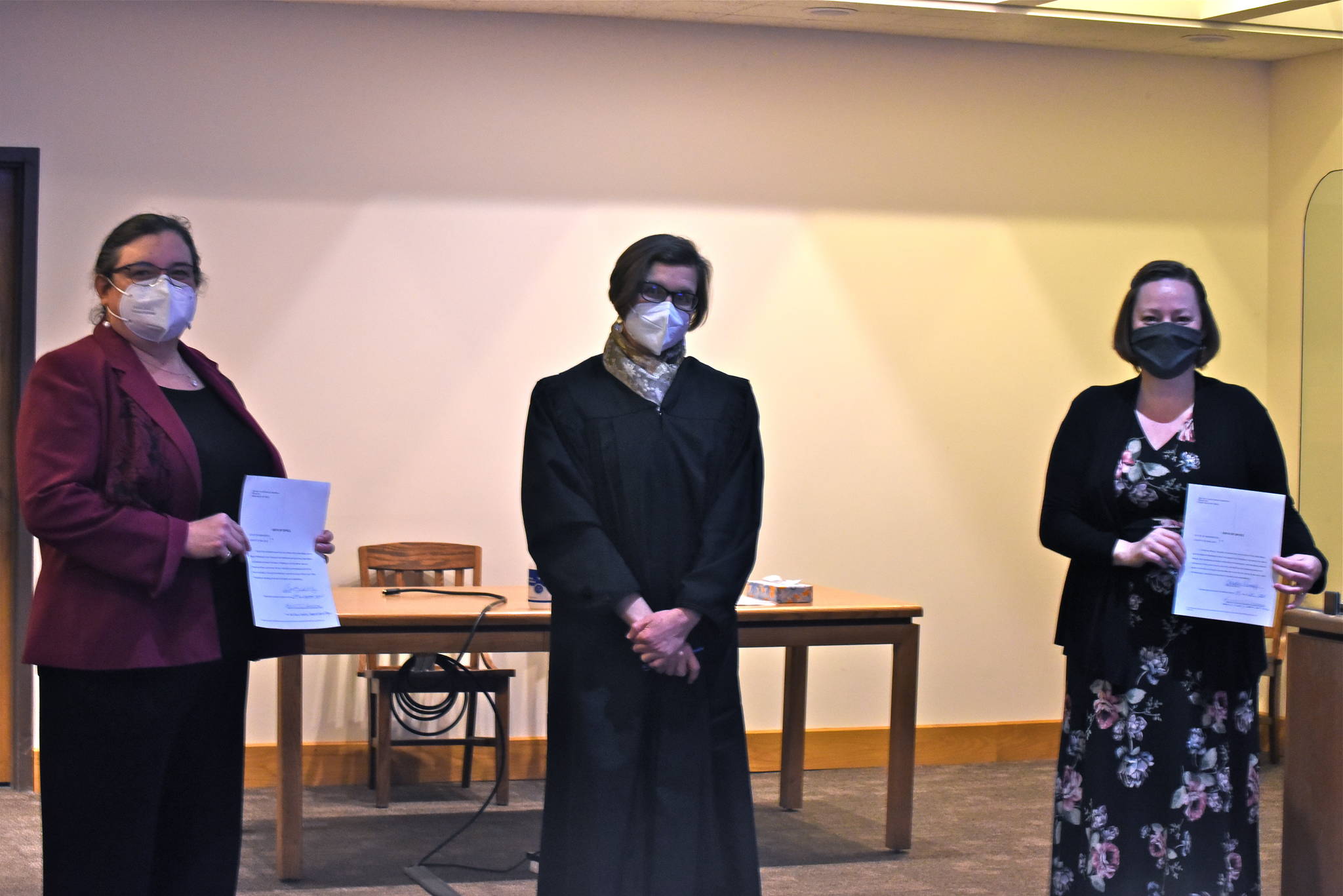 Tate Thomson/Staff photo
(L to R) Cindy Wolf, San Juan County Superior Court Judge Katheryn Loring and Christine Minney after the swear-in on Dec. 29.