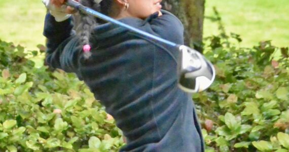 Contributed photo
Melissa Valencia drives off the sixth tee at the Lopez Golf Course in a match against La Conner. Valencia took top honors at the recent District 1 Golf Championship.