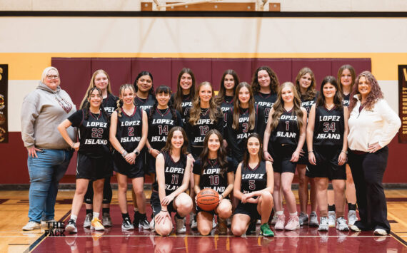 Andrea Huss photo.
Left to right, back row: Assistant Coach Samantha Olson, Saskia Fischer, Evelyn Aguilar-Clavel, Ruby Sausman, Amia Poole, Betty Burt, Kylie Willemsen, Dani Arnott. Middle row: Fatima Velazquez, Ava Bennett, Lulu Velazquez, Iris Ervin-McLean, Lola Woodington, Alivia Trani, Elsie Learing. Coach Karrie Warner. Front row: Seniors Ruby Ervin-McLean, Glory Westervelt, Josie Luckhurst-Slattery.