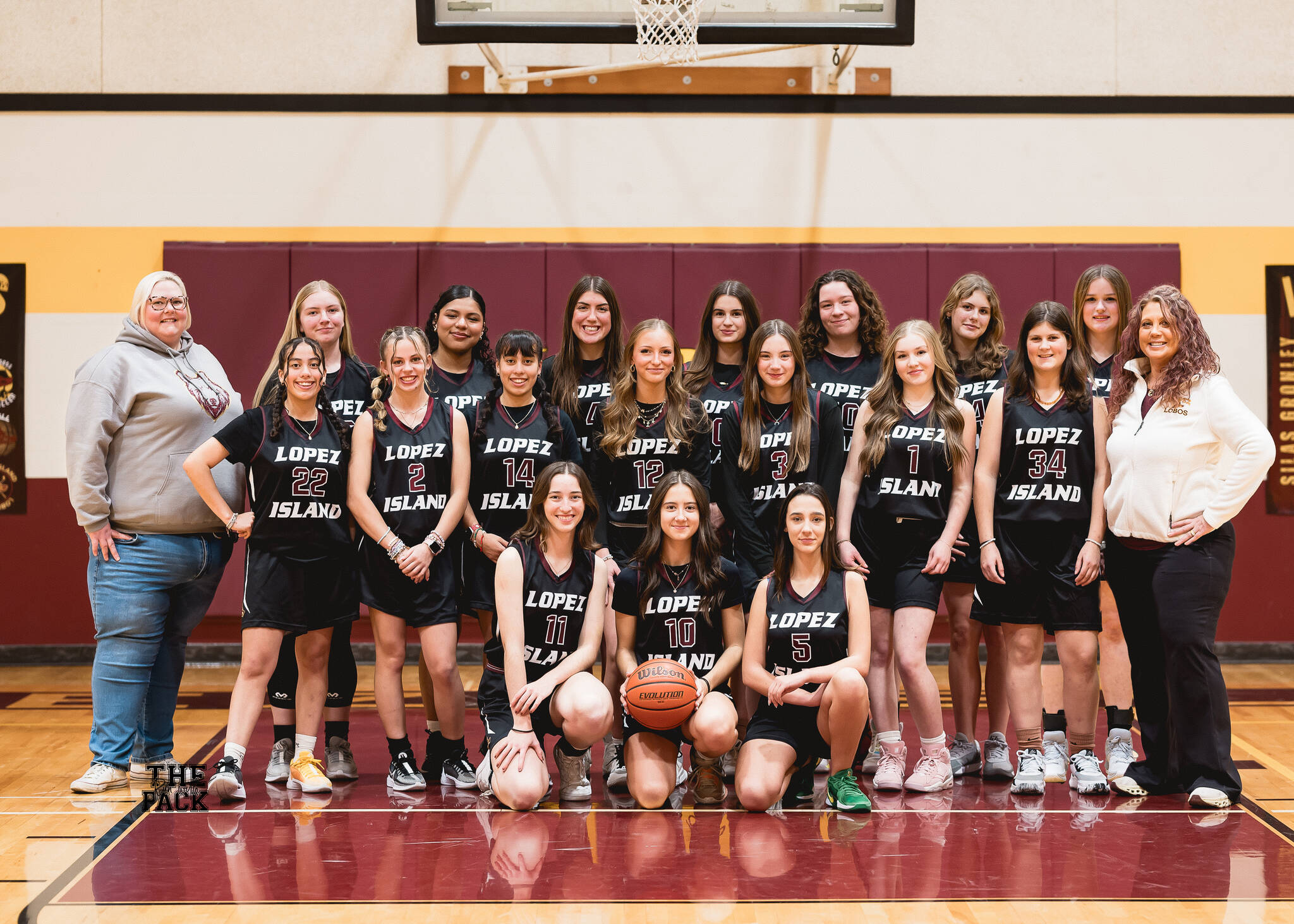 Andrea Huss photo.
Left to right, back row: Assistant Coach Samantha Olson, Saskia Fischer, Evelyn Aguilar-Clavel, Ruby Sausman, Amia Poole, Betty Burt, Kylie Willemsen, Dani Arnott. Middle row: Fatima Velazquez, Ava Bennett, Lulu Velazquez, Iris Ervin-McLean, Lola Woodington, Alivia Trani, Elsie Learing. Coach Karrie Warner. Front row: Seniors Ruby Ervin-McLean, Glory Westervelt, Josie Luckhurst-Slattery.